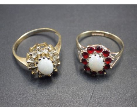 A 9ct gold white Opal and Garnet cluster ring size L - 1.71g and a 9ct gold white Opal and Rock crystal cluster ring size N -