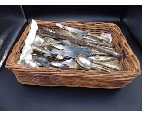 A wicker tray full of E.P.N.S cutlery (Alex R Clark Co Ltd)