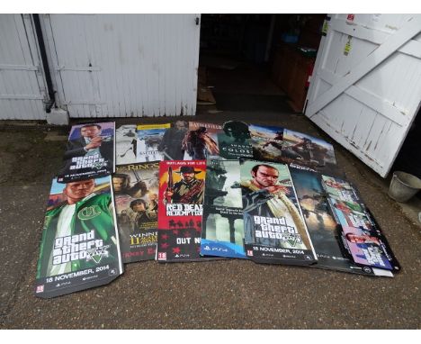 Collection of mostly video game cardboard advertising shop standees to include Star Wars, Grand Theft Auto and Lord of the Ri