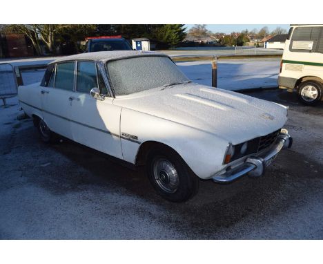 Rover P6 complete restoration project, white paint with black vinyl roof. The original brown interior is in good condition. S