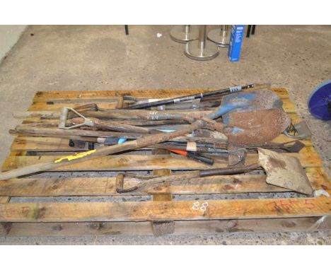 Large quantity of garden tools to include spades, forks, hoes etc