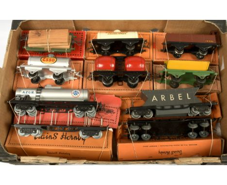 French Hornby 0 Gauge group of Goods wagons consisting of Azur Bogie Tanker, Arbel Hopper, Bogie low sided and a Lumber wagon