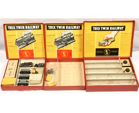 Trix 766 Operating Dump Wagon Set + 2x other set boxes. Comprising Dump Wagon Set containing 0-4-0 loco, 3x wagons, sack of p