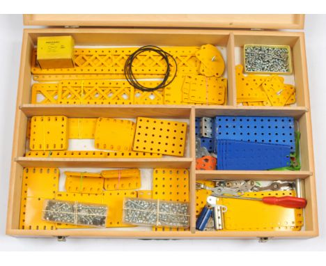 Meccano 1970's Dealers Cabinet. Containing yellow, blue &amp; zinc plates, strips &amp; angle girders, triangular plates, qty