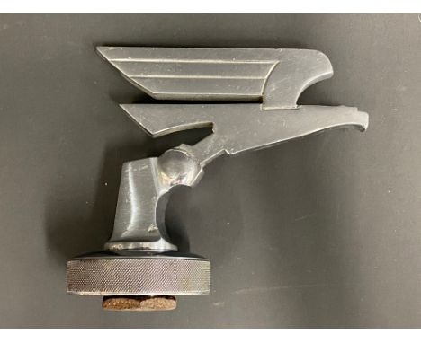 An unusual Art Deco style mascot, raised upon a radiator cap base, with integral temperature gauge tube to the reverse. 