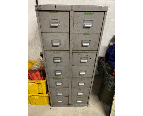 A fourteen drawer metal workshop filing cabinet, full of tools.