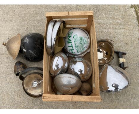 A box of lamp parts including Rotax, Lucas and CAV.