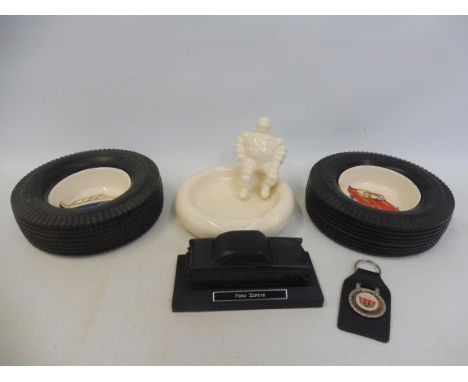 Two rarely seen ceramic and rubber tyre ashtrays advertising the Ford Zodiac and the Zephyr, plus a Ford Zephyr ornament, a M