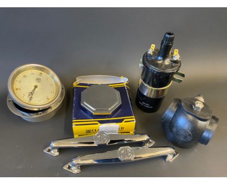 A Smiths vintage car clock bearing MG logo to the dial, an unused rubber 'diver's helmet' tail lamp, an unused coil, an unuse