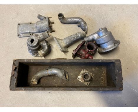 A quantity of Alvis Firebird water pumps and engine castings. 