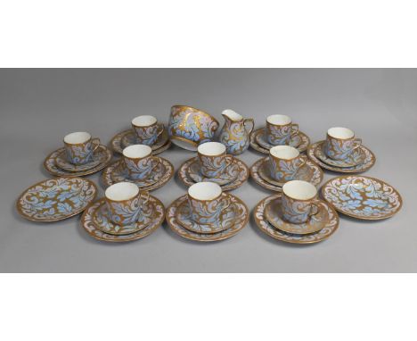 A 19th Century Porcelain Tea Service Decorated with Blue to Purple Ombre Floral Bowls on Gilt Ground to to Comprise Ten Cups,