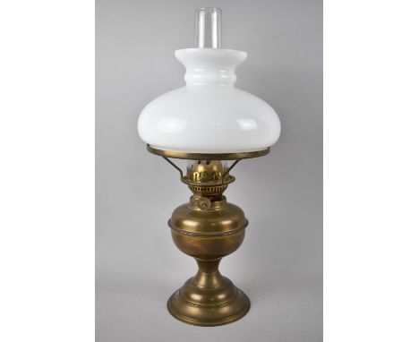A Vintage Brass Oil Lamp with Opaque Shade and Chimney, 49cms High 