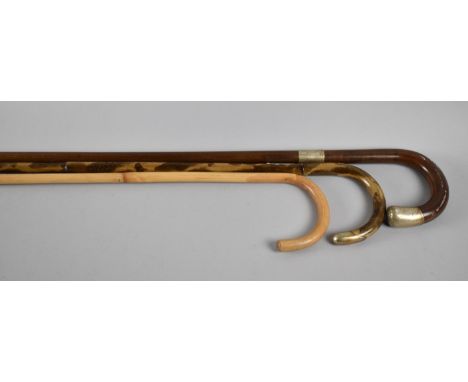 A Collection of Three Walking Sticks, Two with Silver Mounts 