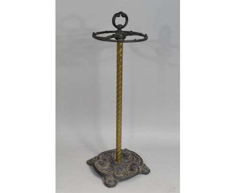 A Late Victorian/Edwardian Cast Iron and Brass Stick Stand, 73cms High 