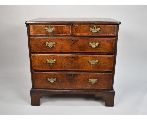 A 19th Century Crossbanded Burr Walnut Chest of Two Short and Three Graduated Long Drawers, String Inlaid Top, Brass Drop Han