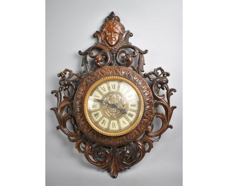 A Mid 20th Century Ornate Wall Hanging Clock with Battery Movement, 50cm high 