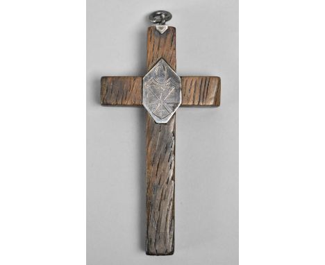 A Silver Mounted Wooden Crucifix inscribed Serve the Lord with Gladness, Jesus Only, 10cms high 