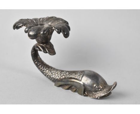 A Novelty Maltese Metal Candlestick in the Form of a Dolphin, 14cms Long 