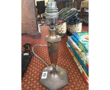 A silver candlestick table lamp base.