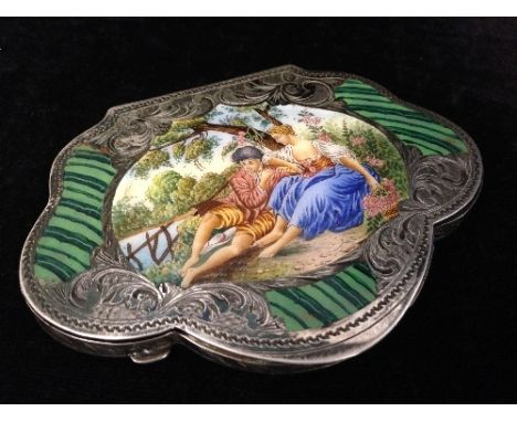 An early 20th century Continental silver and enamel powder compact, the lid decorated with Two Young Lovers in a Pastoral Sce