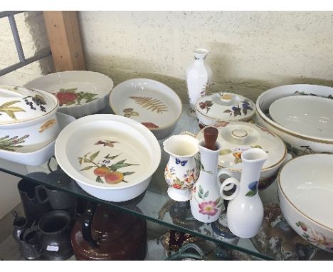 A shelf containing a quantity of Royal Worcester Evesham and other designs Oven-to-Tableware items together with Royal Crown 