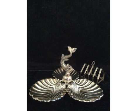 A sterling 925 silver nut dish with fish finial and scallop shape trefoil base together with a small four bar silver toast ra