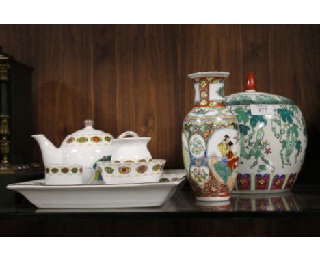 AN ORIENTAL CERAMIC LIDDED VASE TOGETHER WITH ANOTHER VASE AND A TEASET