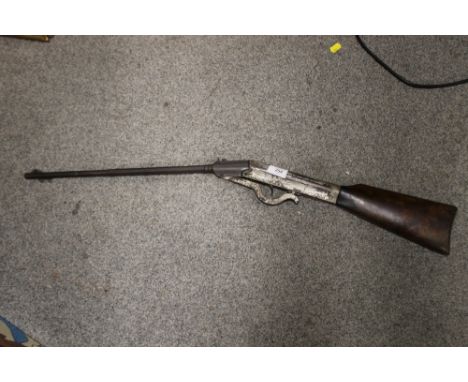 A VINTAGE SPRING LOADED FAIRGROUND TYPE .177 GUN