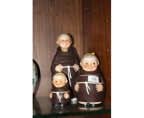 THE GOEBEL CERAMIC MONKS COMPRISING OF A DECANTER, MONEY BOX AND A LIDDED JAR