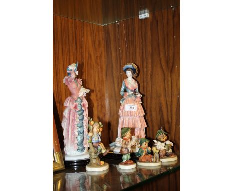 A PAIR OF LARGE LEONARDO COLLECTION FIGURES TOGETHER FOUR SMALL GOEBEL FIGURES