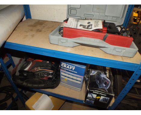 A CASED HAMMER DRILL, CASED SANDER TOGETHER WITH A ROUTER AND A 650 W PLANER