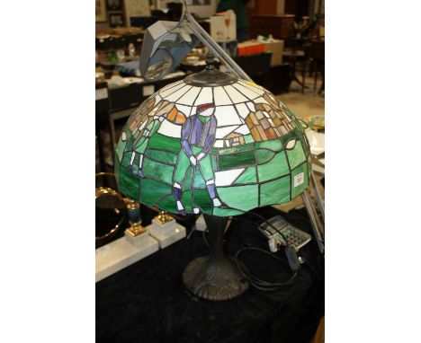 A LARGE TIFFANY STYLE 'GOLFER' DESIGN SHADE TABLE LAMP