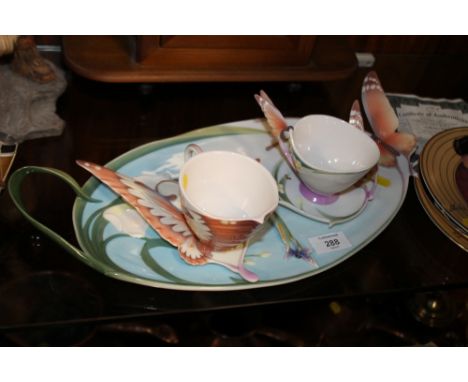 A FRANZ PORCELAIN BUTTERFLY SERVING TRAY WITH TWO TEA CUPS, SAUCERS AND A SPOON (6)