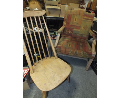 AN UPHOLSTERED ARMCHAIR AND AN ERCOL TYPE CHAIR (2)