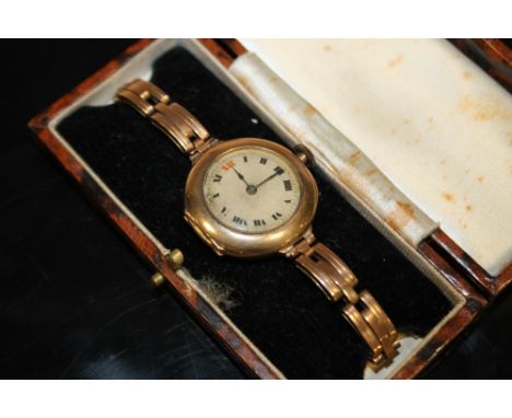 A BOXED 9 CARAT ROSE GOLD VINTAGE MANUAL WIND WRIST WATCH  WRIST