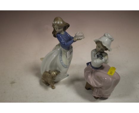 TWO NAO FIGURES OF GIRLS WITH PUPPIES 