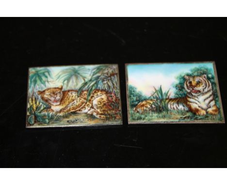 TWO UNUSUAL ENAMEL ON SILVER PLAQUES FEATURING A LION AND A LEOPARD STAMPED 'SILVER' 