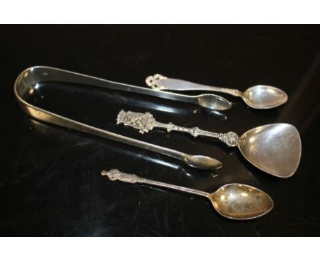 A PAIR OF GEORGIAN HALLMARKED SILVER SUGAR TONGS, CADDY SPOON ETC.