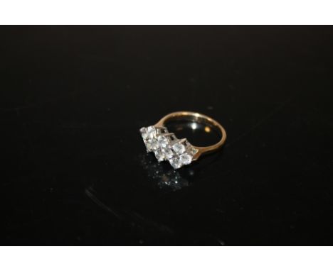 A 9 CARAT GOLD LADIES CLUSTER RING