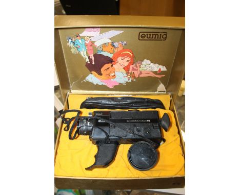 A BOXED VINTAGE EUMIG MINI 5 CINE CAMERA 