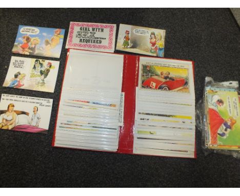 AN ALBUM OF NOVELTY VINTAGE POSTCARDS