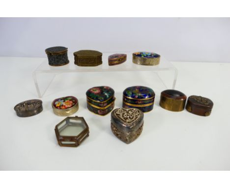 A collection of small trinket or pill boxes to include cloisonne and similar. [W]