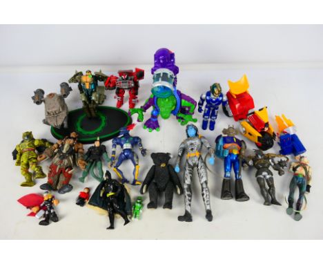 Marvel - Lego - Transformers - A group of action figures including Wolverine Mutant Cycle, Biker Mice From Mars, Reboot Glitc