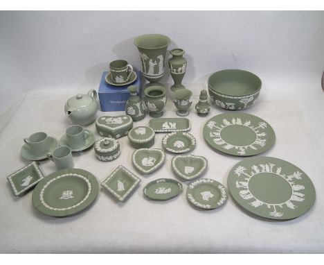 A collection of Wedgwood green Jasperware to include large bowl, plates, vases, trinket dishes and boxes and other, also incl