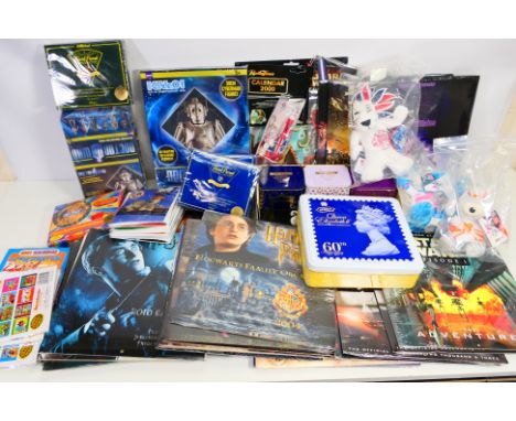 A quantity of factory sealed calendars, Harry Potter and Star Wars related, Diamond Jubilee tea and biscuits, Dr Who construc