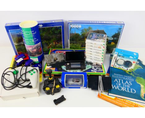 Nintendo - A Nintendo DS3 with 8 x cased games and a DS Walk With Me Activity Meter, 2 x factory sealed jigsaw puzzles, a Cha