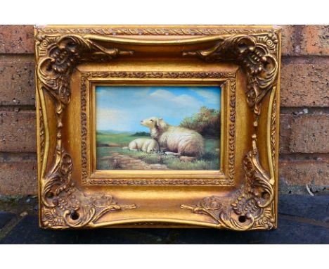 A small ornately framed print depicting a sheep and a lamb, approximately 11 cm x 17 cm image size. [W]