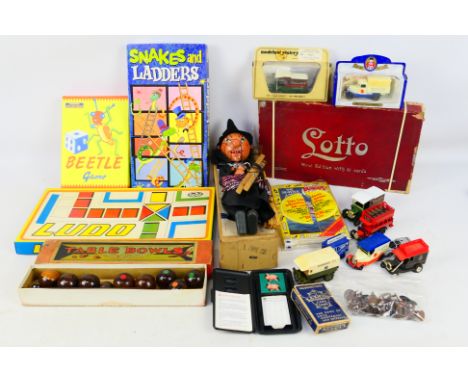 Philmar - Falcon - Spears - Pelham - A group of vintage games, a boxed Pelham Witch Puppet, a limited edition Ford van in Hol