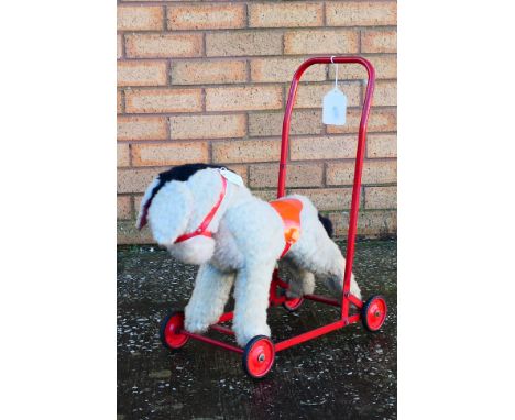 Chiltern - A vintage Chiltern push-a-long Donkey. The donkey has some general age and play wear but overall appears to be in 