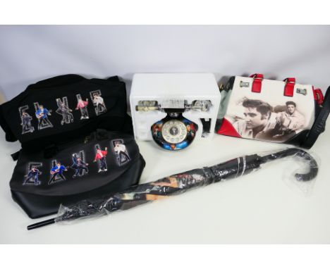 Elvis Presley - A collection of Elvis related items to include a boxed Bradford Exchange Ultimate Elvis Telephone, handbags, 